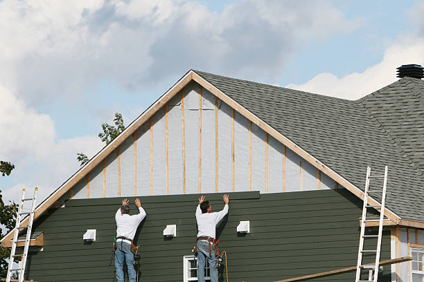 Professional Siding technician working in Okeana, OH